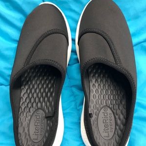 Black and white crocs light ride